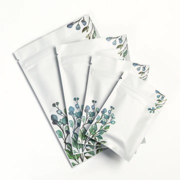 [SAMPLE] 80mm x 120mm White with Green/Blue Flower Matt 3 Side Seal Bags